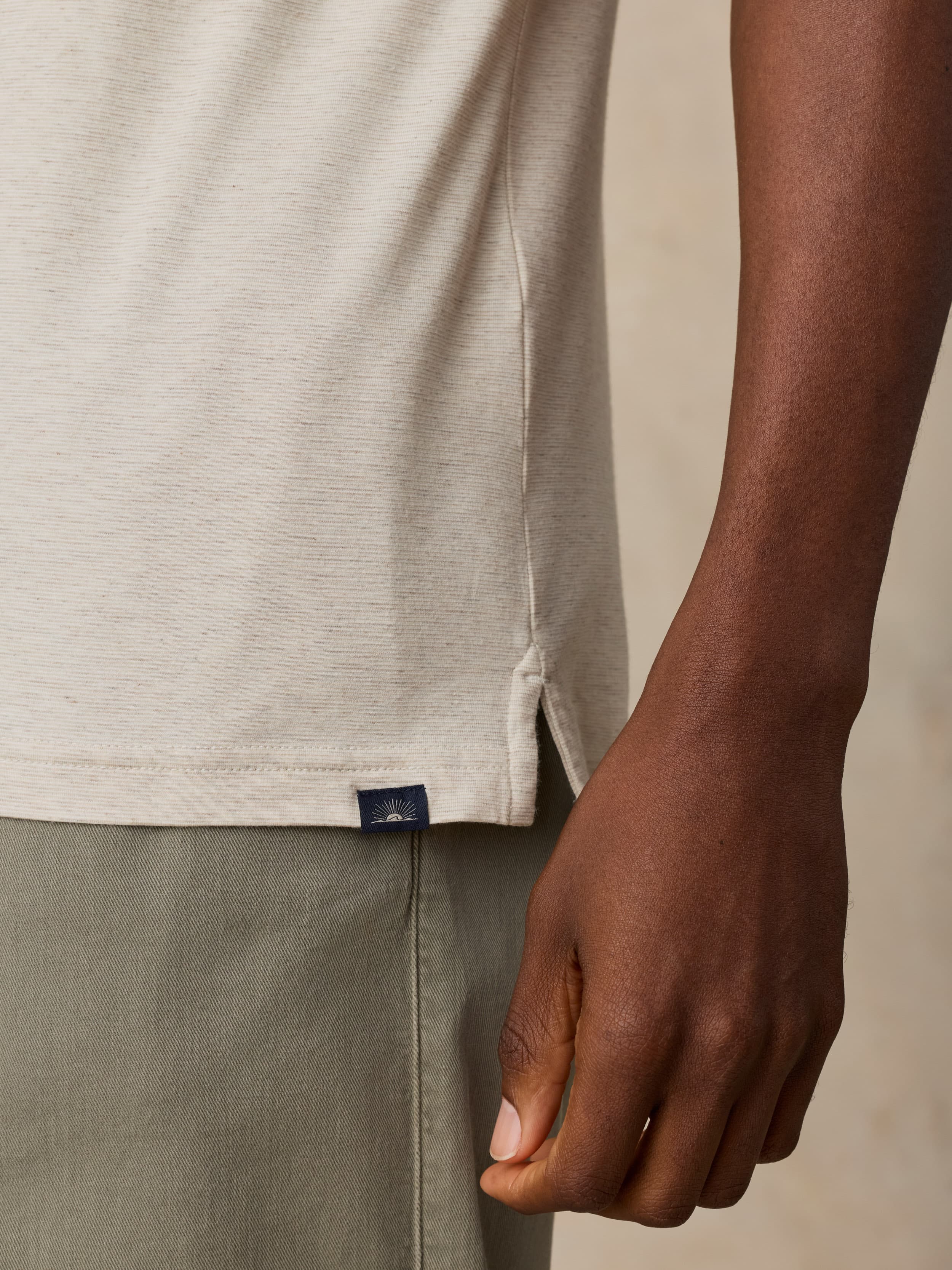 Short-Sleeve Movement™ Polo - Shore Sand Feeder