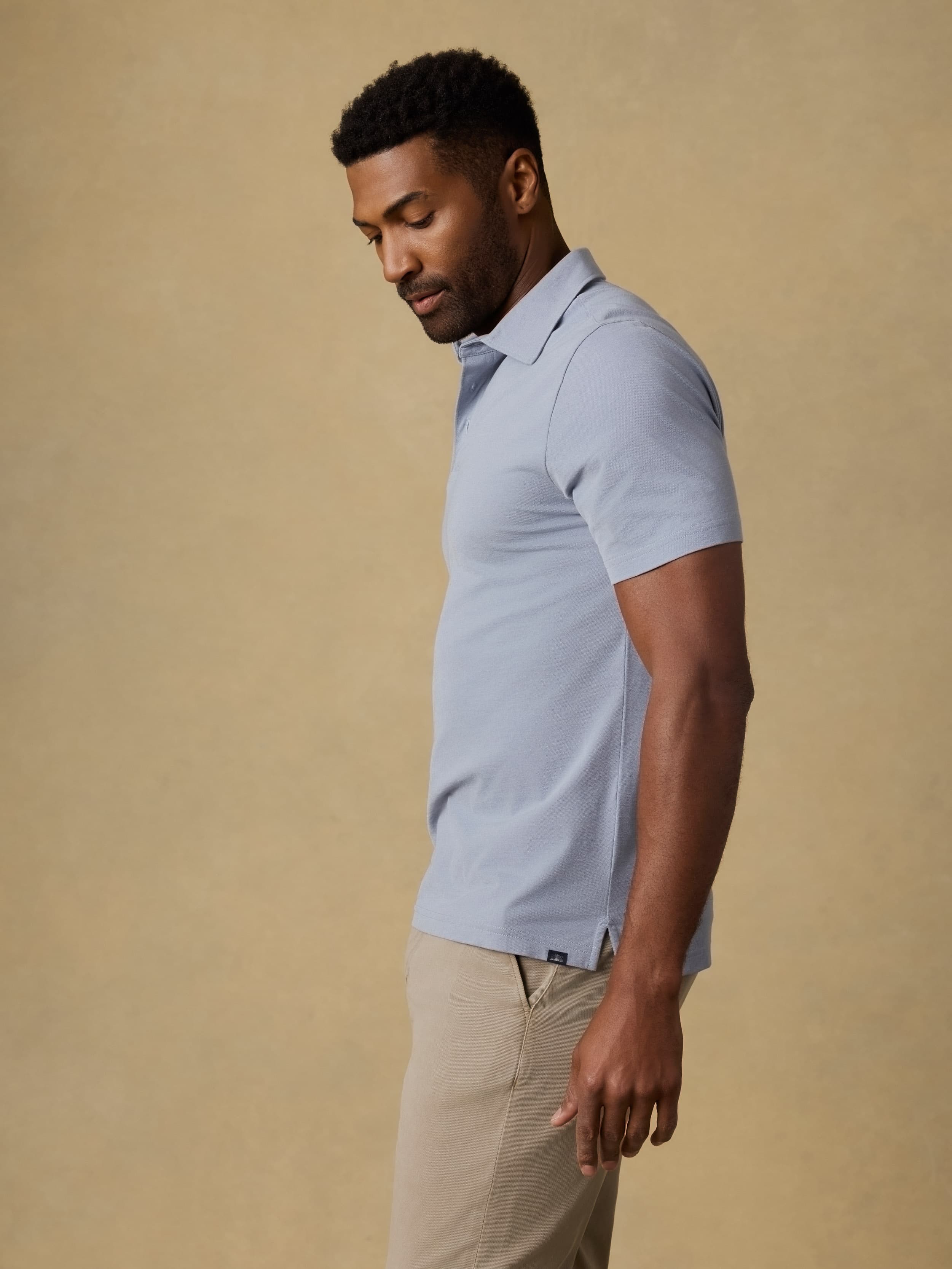 Short-Sleeve Movement™ Pique Polo - Flint White Melange